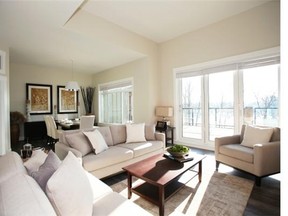 Falcon Homes stuck to a neutral palette in the show suite at Reflections on the River, and this is reflected in everything from the grey hardwood flooring to the cream sofa and chair ensemble.