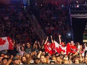 Fans cheer at a UFC fight night last Aug. 23 in Saskatoon.   — Postmedia News files