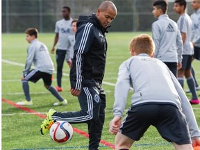 Former Vancouver Whitecaps player Robert Earnshaw works on a soccer drill as he starts his first day as the head coach for the U14s in Burnaby.   Gerry Kahrmann/PNG