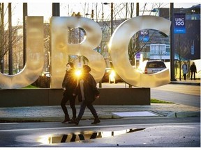 UBC glows in the late-evening light while students walk around campus in February. The provincial government appointed Greg Peet the school’s board of governors, despite knowing he was trying to avoid paying more than $1 million in taxes owed by his firm.  Mark van Manen/PNG files