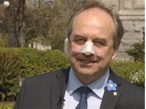 Green Party MLA Andrew Weaver wins the Injured-in-the-line-of-duty Purple Heart for breaking his nose when he walked into a window pane while texting. -- Facebook