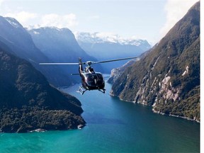 Guests of Matakauri Lodge can take in the aerial views of glaciers and Milford Sound via helicopter and get dropped off teps from their cottage.