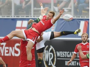 Harry Jones of Canada vies for the ball against South Africa Friday in Las Vegas. Jones says that rugby stars trying the sevens  game ‘tells you that it’s a big deal, it’s a real thing.’