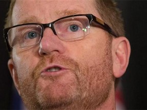 British Columbia Health Minister Terry Lake speaks during a news conference after the first day of a meeting of provincial and territorial health ministers in Vancouver, B.C., on Wednesday January 20, 2016. Firefighters in Vancouver and Surrey, B.C., have been moved to the frontlines in the battle against the soaring number of overdoses and drug deaths. Lake says certain specially licensed firefighters will be allowed to administer naloxone, a drug that reverses opiod overdoses, such as those caused by fentanyl. THE CANADIAN PRESS/Darryl Dyck