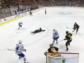 Bo Horvat sprawls on the ice to block a shot in the Canucks’ 5-2 loss Saturday to the Toronto Maple Leafs.