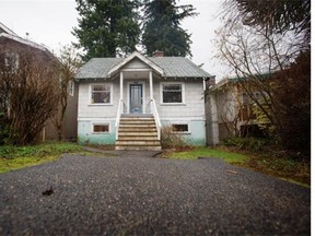 A house built in 1930 that was listed for $2.398 million is seen in the Point Grey neighbourhood of Vancouver on Jan. 29. — THE CANADIAN PRESS files