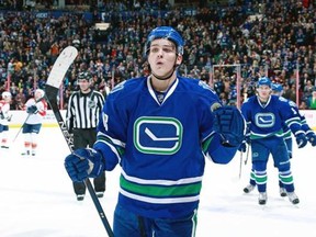 Jake Virtanen of the Canucks skates to the bench after scoring against the Florida Panthers at Rogers Arena in Vancouver on Jan. 11. — Getty Images files