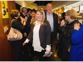 The NDP’s Jodie Wickens arrives at her campaign headquarters Tuesday night with party leader John Horgan to celebrate her victory in the Coquitlam-Burke Mountain riding.