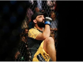 Johny Hendricks looks pensive in a 2013 photo. Four months ago, Hendricks seemed destined for the middleweight division or perhaps even early retirement.