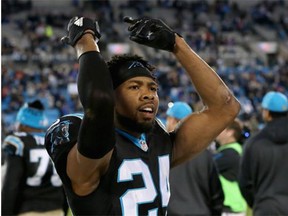 Josh Norman of the Carolina Panthers pumps up the crowd after their victory over the Tampa Bay Buccaneers Jan. 3.  The Panthers finished the regular season at 15-1 and host the Seattle Seahawks (10-6) on Sunday.