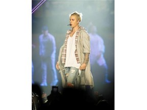 Justin Bieber performs at Rogers Arena in Vancouver on Friday. Some concertgoers bought fraudulent tickets.