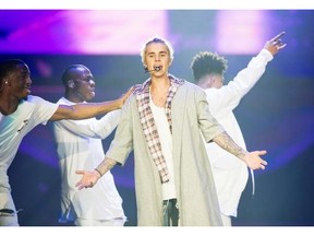 Justin Bieber sings during his concert at Rogers Arena in Vancouver, BC, March, 11, 2016.