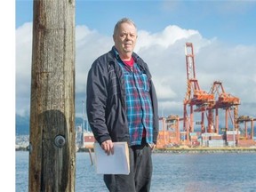 Don Larson, longtime Downtown Eastside activist and president of the Crab — Water for Life Society, stands at Crab Park at Portside in Vancouver on Tuesday. Larson is concerned about the impact the Centerm expansion will have on the small park. Arlen Redekop/PNG