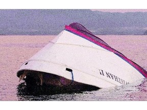 The bow of the Leviathan II, owned by Jamie's Whaling Station, is seen near Vargas Island Oct. 27 after six people died when the vessel capsized.