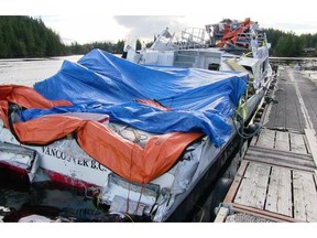 The Leviathan II whale-watching vessel sits at a dock after it was raised and towed from the Tofino, B.C., area on Friday, Oct. 30, 2015. The 20-metre-long ship has been towed to a secure location, where it will be monitored by the RCMP. THE CANADIAN PRESS