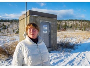Libby Dybikowski stands at the site of the well that provides drinking water to residents of an area near Merritt.   Ric Ernst/PNG files