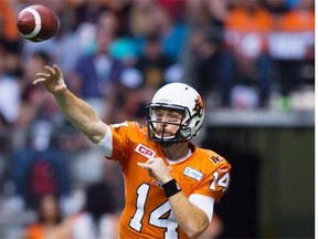 B.C. Lions quarterback Travis Lulay, shown passing against Montreal last August at B.C. Place, signed a two-year contract extension Monday on the eve of CFL free agency.