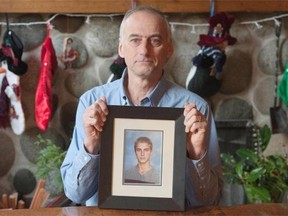 Mark Bodie holds a photo of his 17-year-old son Jack, who died from a fentanyl-related overdose in August, 2015.     Jason Payne/PNG