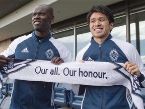 Pa-Modou Kah, left, and new Vancouver Whitecaps teammate Masato Kudo will be giving it their all this year.