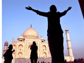 An ‘ah-ha’ moment at the Taj Mahal in Agra the mausoleum built by Shah Jahan for his queen Mumtaz Mahal .  — photos: Steve MacNaull