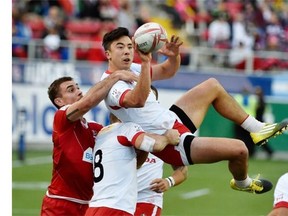 Nathan Hirayama of Canada grabs the ball during the USA Sevens Rugby tournament against Russia in Las Vegas on March 5.