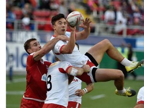 Nathan Hirayama of Canada handles the ball against Russia during the USA Sevens Rugby tournament in Las Vegas.   David Becker/Getty Images