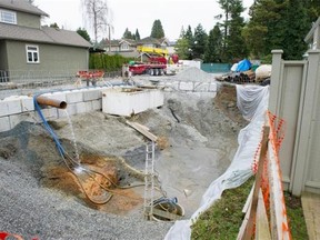 Nearly 2 million litters of fresh water spill each day from an accidental breach of a water aquifer at a house under construction at 7084 Beechwood Street in Vancouver, BC. Drilling for a geoexchange system caused the breach last October. The city plans on drilling 4-5 wells to relieve the pressure, which could cause a sinkhole, but in the meantime two adjacent homes are under evacuation alert and several more could follow.