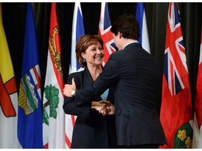 Prime Minister Justin Trudeau welcomes B.C. Premier Christy Clark to the First Ministers meeting at the Canadian Museum of Nature. Clark desperately needs Trudeau and the federal government to give the go-ahead on  fracked-in-B.C. liquefied natural gas.