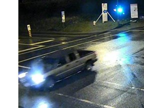 Abbotsford police released these CCTV images Tuesday as they investigate two Sunday night shooting incidents. Although police don't know whether the SUV and truck (pictured) were involved in the shootings, they believe those who were in the vehicles might be able to assist the investigation.