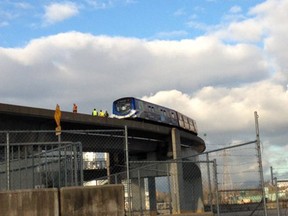 A train stopped on the Canada Line bridge on Tuesday afternoon.