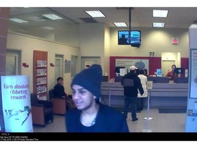 Police believe this man is responsible for nine bank robberies in Vancouver and Burnaby. In all of the robberies, the suspect stated he was armed with a weapon. He is described as South Asian, in his 20s, 5'5" tall, with a skinny build, and short black hair that is shaved on the sides. Police are asking for anyone who knows the identity of this man to call investigators at 604-717-2541 or Crime Stoppers at 1-888-222-8477.