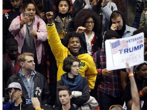 Protesters against Republican presidential candidate Donald Trump chant 'Bernie, Bernie, and We Stopped Trump,' after a rally on the campus of the University of Illinois-Chicago, was canceled Friday, March 11, 2016, in Chicago.