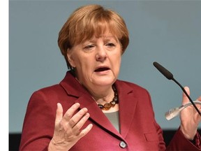 German Chancellor Angela Merkel gives a speech during a regional meeting of her Christian Democratic Union (CDU) party on January 30, 2016 in Neubrandenburg, northeastern Germany. Merkel said she expected most of the refugees from Syria and Iraq to return home once peace has returned to their countries, as she faces strong pressure over her welcoming stance towards asylum seekers.