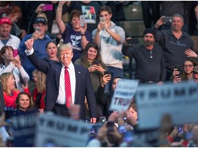 Republican presidential candidate Donald Trump speaks to guests during a rally at Macomb Community College on March 4, 2016 in Warren, Michigan. Voters in Michigan will go to the polls March 8 for the State's primary.