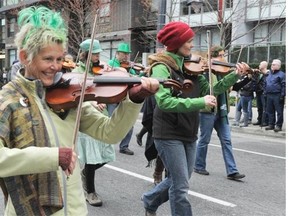 The St. Patrick’s Day parade makes its way down Howe Street in 2015.