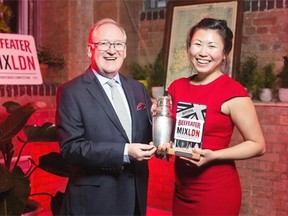 Evelyn Chick, 27, pictured in red, has won the 2015 Beefeater MIXLDN cocktail bar tending competition.