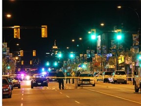 Police were on the scene of the fatal shooting at Cambie Street and West 19th Avenue on the evening of Sept. 30, 2009.    Pascal Marchand/PNG FILES