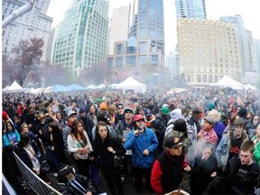 Pot protesters gather in front of Vancouver Art Gallery for the annual 4/20 marijuana smoke-in on April 20, 2014. City staff proposed the event be relocated to Sunset Beach but the park board has filed its own protest.