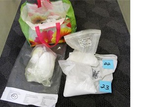 RCMP have charged four people in a dismantled Chilliwack dial-a-dope operation that was being investigated throughout 2014 and 2015.Seized exhibits from the scene are shown.