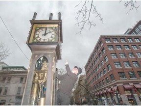 Ray Saunders is going to be busy on Sunday and Monday resetting eight public clocks around Metro Vancouver, including the Steam Clock in Gastown. Arlen Redekop/PNG