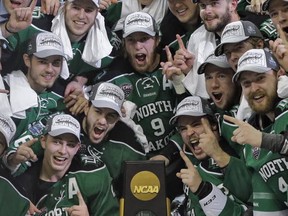 While North Dakota sits at the top of the NCAA Div. 1 hockey world, Simon Fraser University has designs on joining their ranks,  (AP photo, Chris O'Meara)