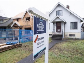 A sold home is pictured in Vancouver last month. A new study by Ecotagious shows the vacancy rate in the city hasn't changed much since 2002, at about five per cent, with condos and rental suites the highest.