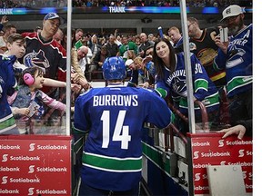 Alex Burrows leaves the ice following the Canucks' final game of 2015-16.