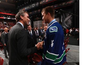 Nikita Tryamkin greets his team after being selected 66th overall by the Vancouver Canucks during the 2014 NHL Entry Draft at Wells Fargo Center on June 28, 2014 in Philadelphia, Pennsylvania.