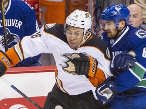 Emerson Etem (left), then with the Anaheim Ducks, gets into it with Canucks defenceman Yannick Weber during a 2014 game at Rogers Arena.