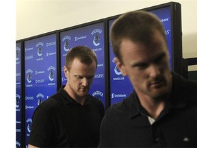 Henrik (l) and Daniel after talking to media as the Vancouver Canucks wrap up their unsuccessful season in Vancouver, BC., April 11, 2016.