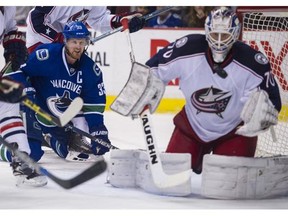 Henrik Sedin and the Canucks found it hard sledding to get to the front of the net vs. the Blue Jackets on Thursday.