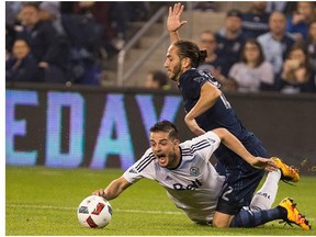 Octavio Rivero (bottom) and the Whitecaps lost 2-1 on March 12, 2016 at Children's Mercy Park in Kansas City, Kansas.