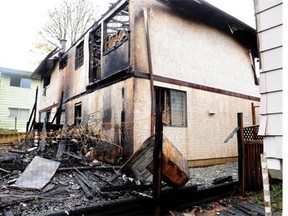 This house in the 11400-block 142 Street in Whalley was reduced to a charred ruin in the early hours of Oct. 10, 2015.   Nick Procaylo/PNG files