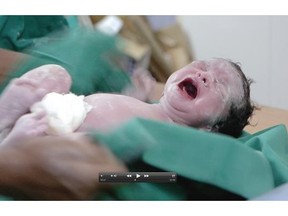 This image, made in 2015 in Anand, in the state of Gujarat, northwestern India, is from an upcoming documentary on overseas surrogate mothers by producer Nick Orchard.   — Soapbox Productions